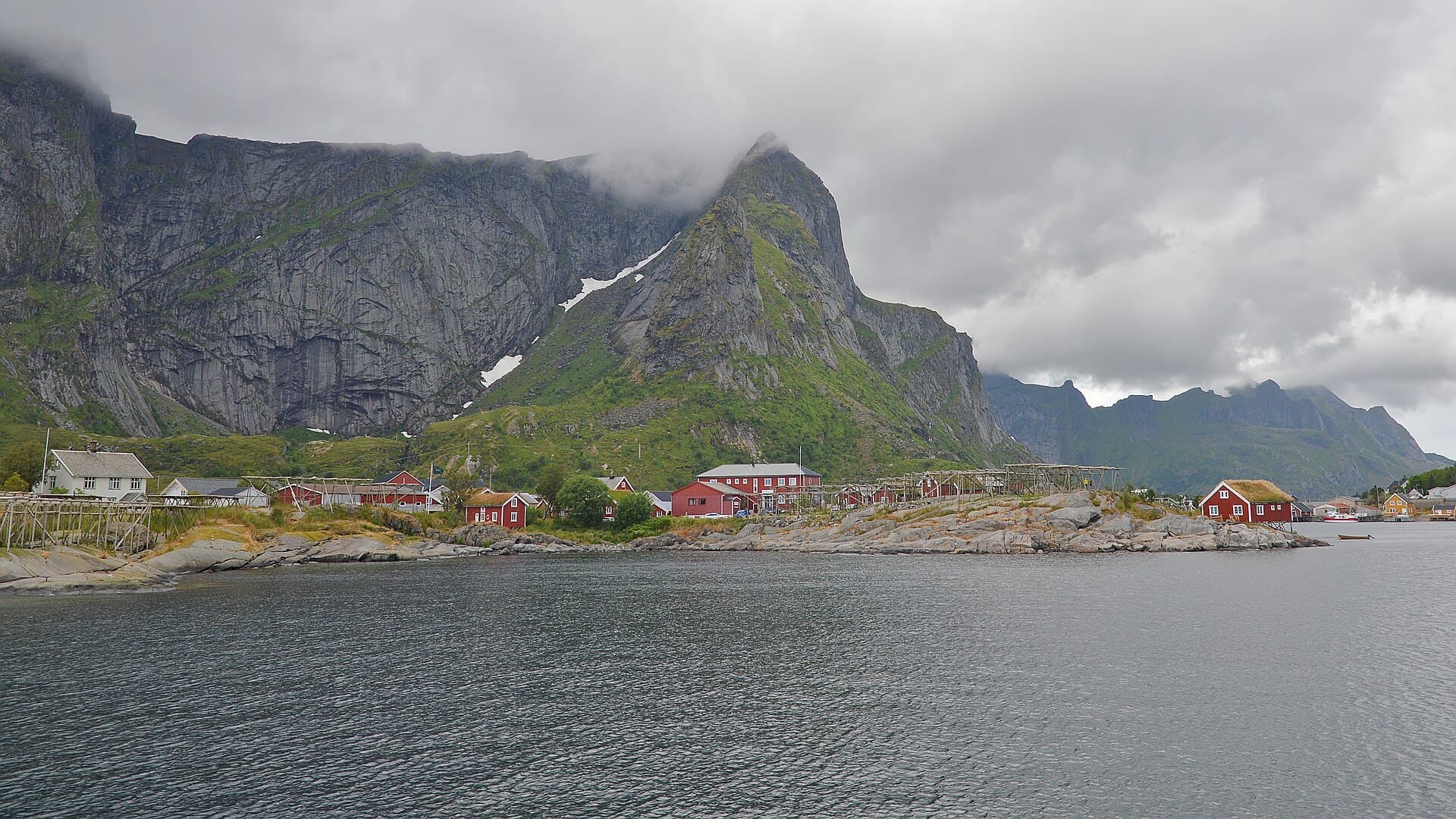 The red fishing village of Reine with Navaren peak and Reinefjorden, Lofoten