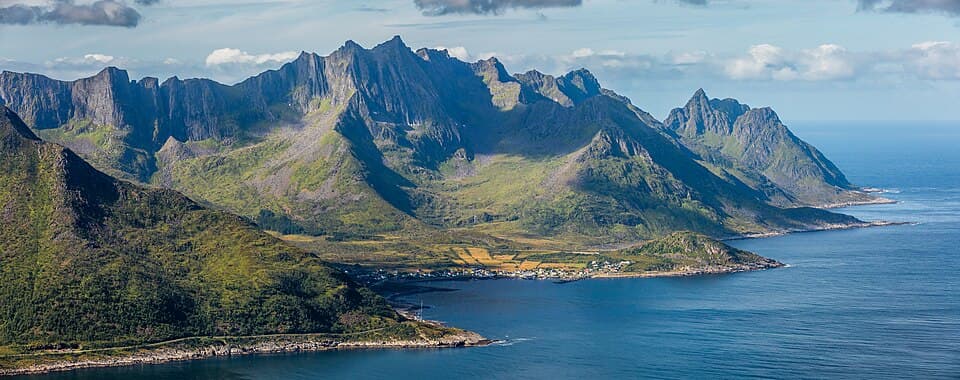 The fishing village of Mefjordvær below Hesten mountain on Senja