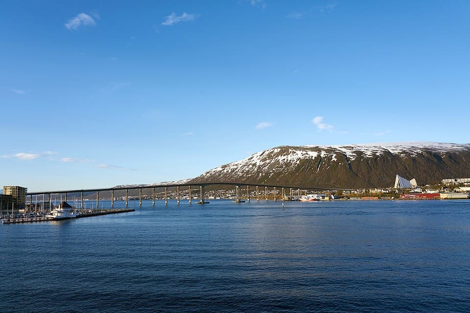 The Arctic Cathedral and Tromsø Bridge with mountains behind
